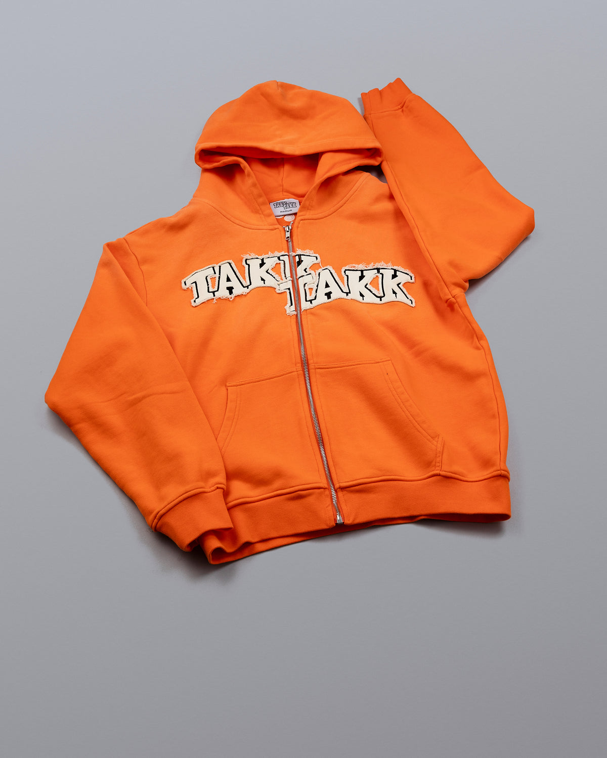 ORANGE TAKK ZIP HOODIE