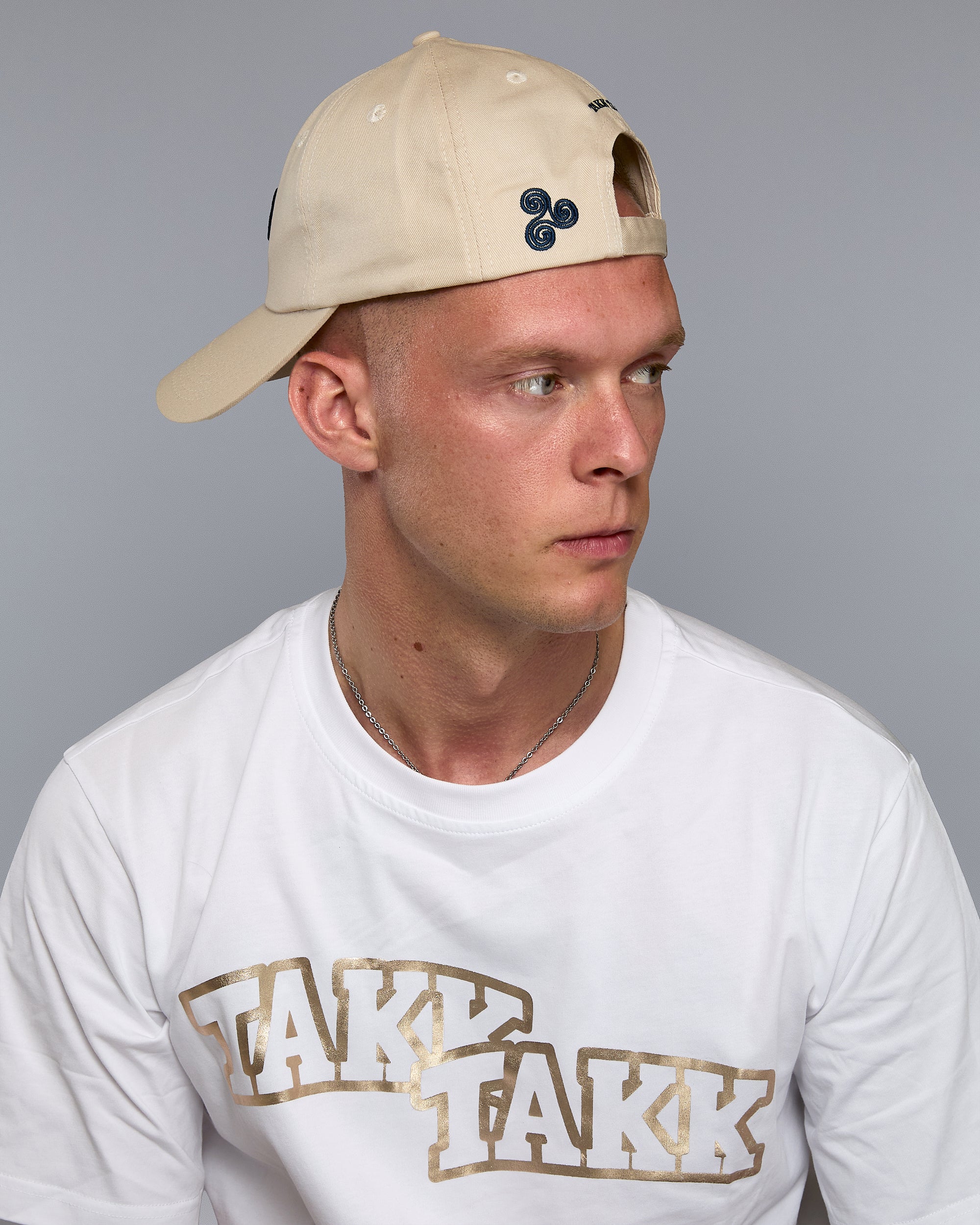BEIGE TRISKELION CAP