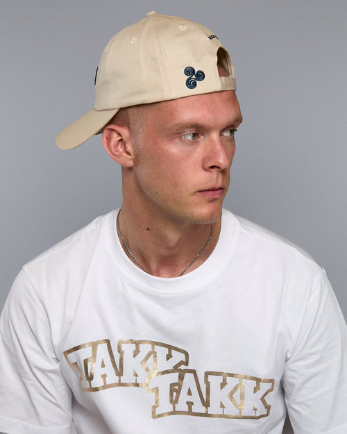 BEIGE TRISKELION CAP