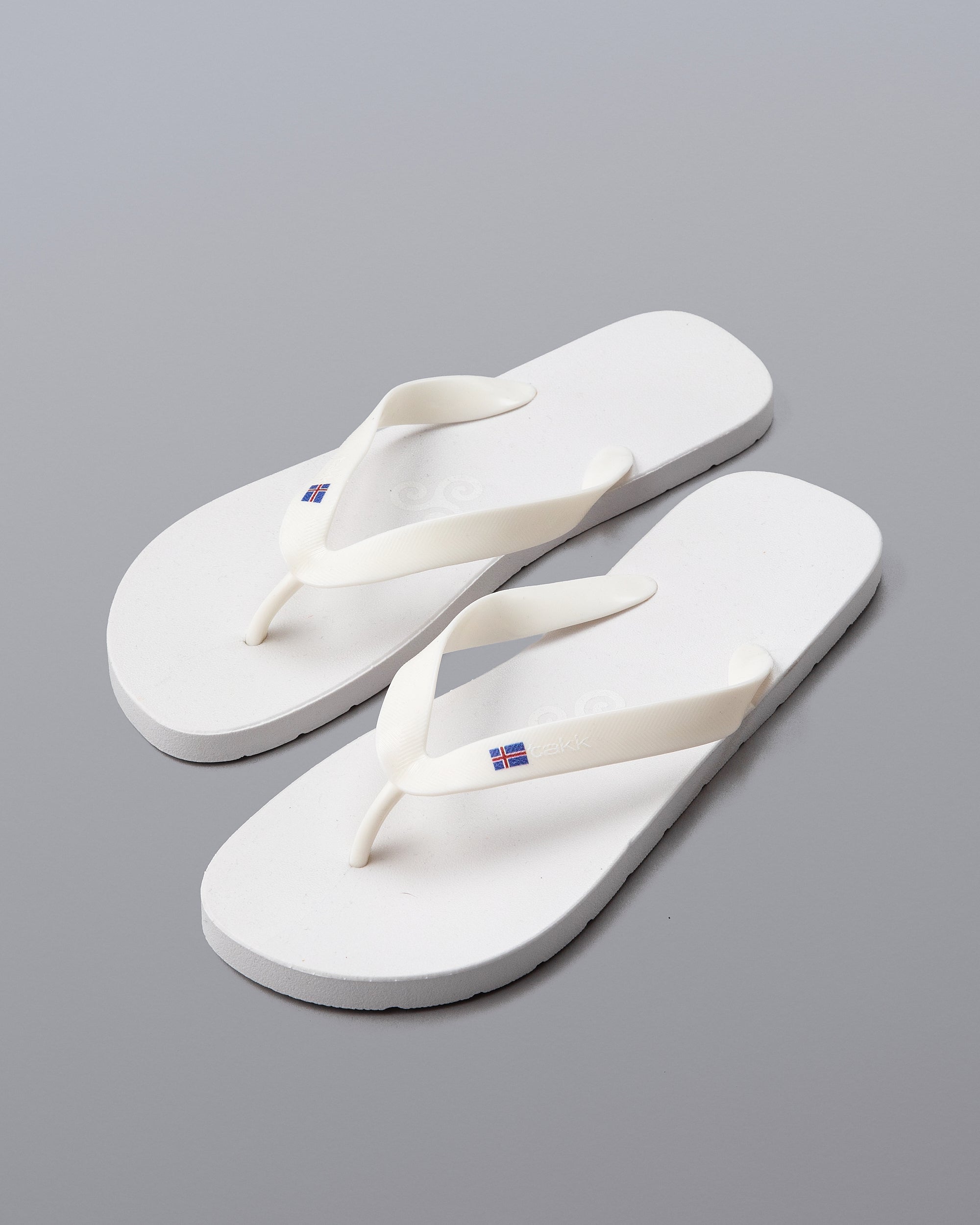 WHITE TAKK FLIP FLOPS
